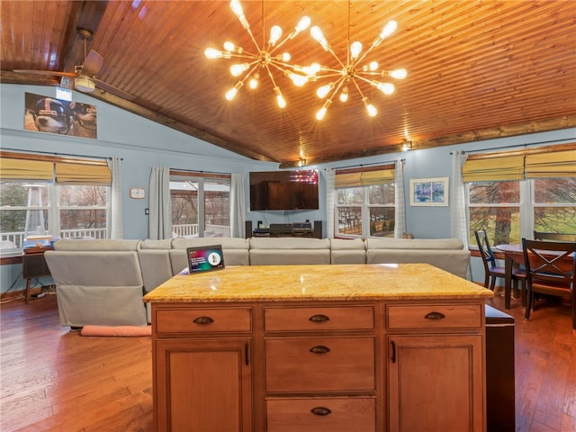 kitchen with an inviting chandelier, vaulted ceiling, wooden ceiling, plenty of natural light, and hardwood / wood-style floors