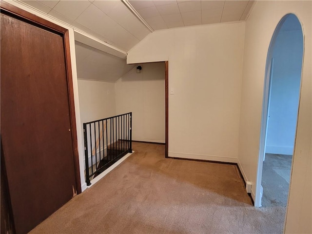 interior space featuring vaulted ceiling