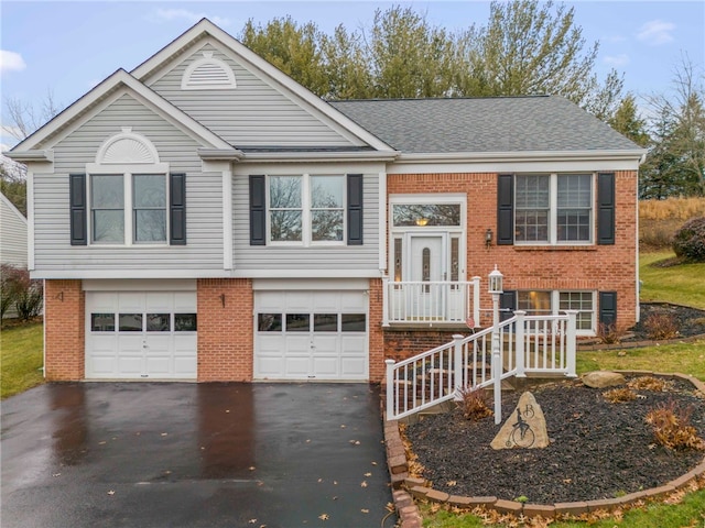 split foyer home featuring a garage