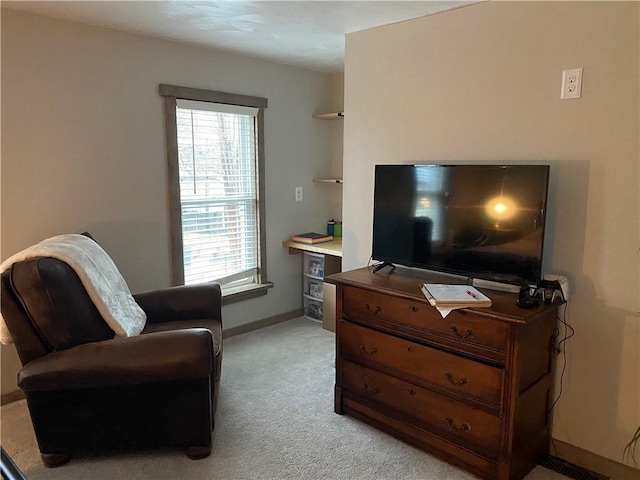 living room featuring light carpet