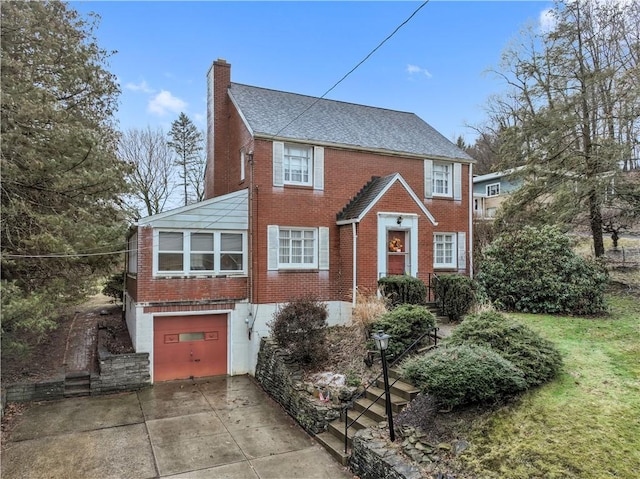 colonial-style house featuring a garage