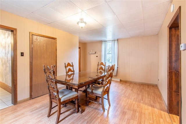 dining room featuring light hardwood / wood-style floors