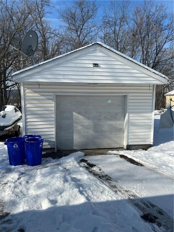 view of snow covered garage