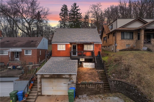 view of front of property featuring a garage