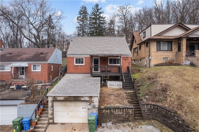 view of front of house with a garage and a porch