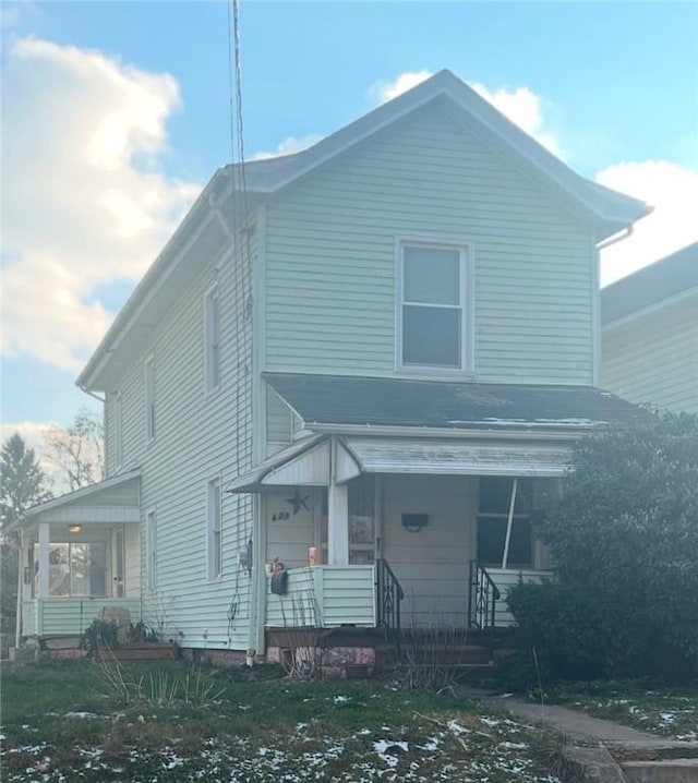 front of property featuring a porch