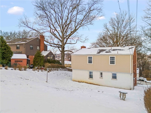 view of snow covered property