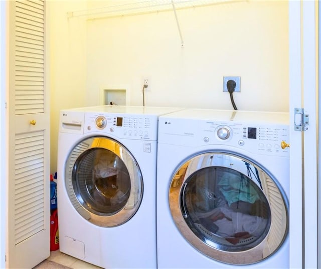 laundry area with washer and dryer