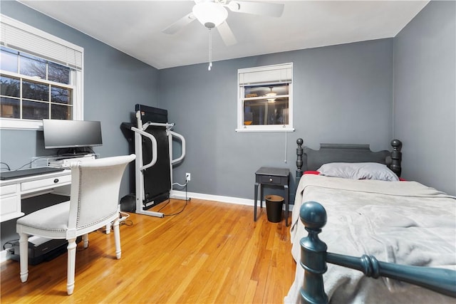 bedroom featuring light hardwood / wood-style flooring and ceiling fan