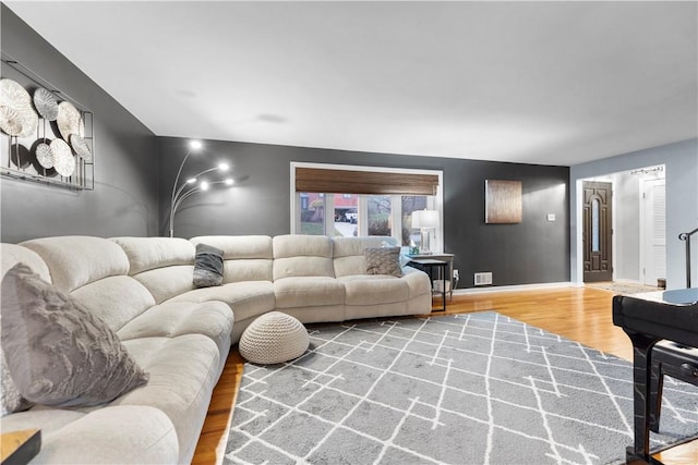 living room with wood-type flooring