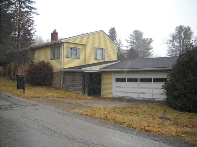 view of home's exterior with a garage