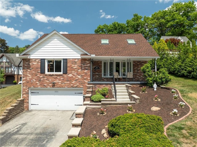 view of front of home featuring a garage and a porch