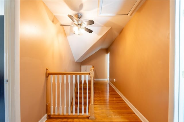 bonus room with lofted ceiling and wood-type flooring