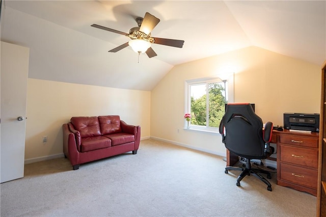 carpeted home office with vaulted ceiling and ceiling fan