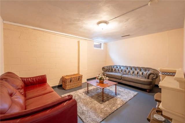 living room featuring concrete flooring