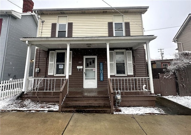 view of front of property featuring covered porch