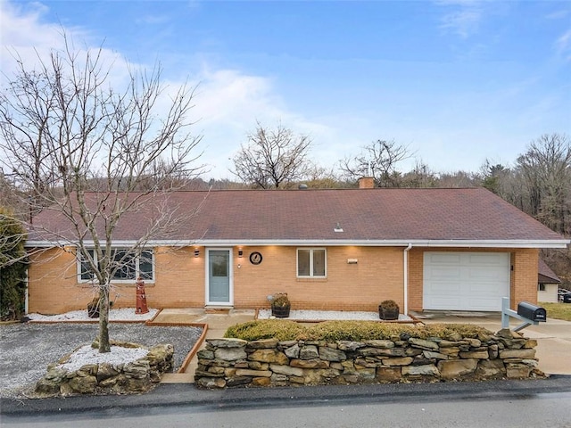 single story home with a garage