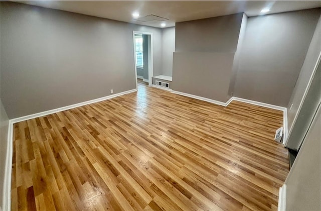 empty room with light wood-type flooring