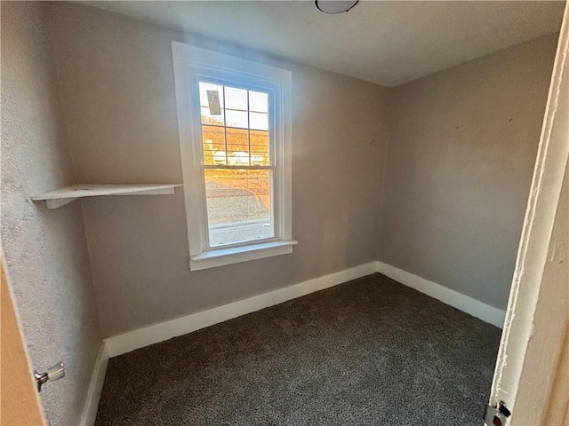 30 1st St, Leetsdale, PA 15056 - spare room featuring dark carpet and baseboards