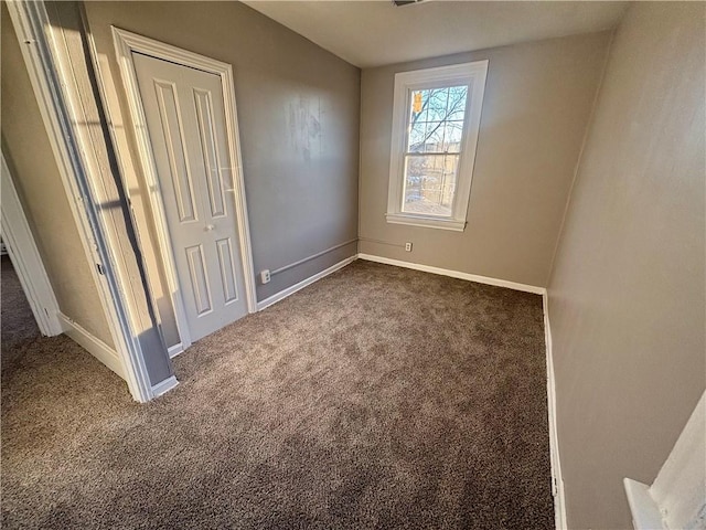 30 1st St, Leetsdale, PA 15056 - unfurnished bedroom featuring dark colored carpet and baseboards