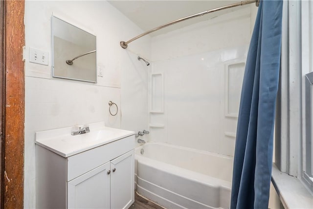 bathroom with shower / bath combination with curtain and vanity