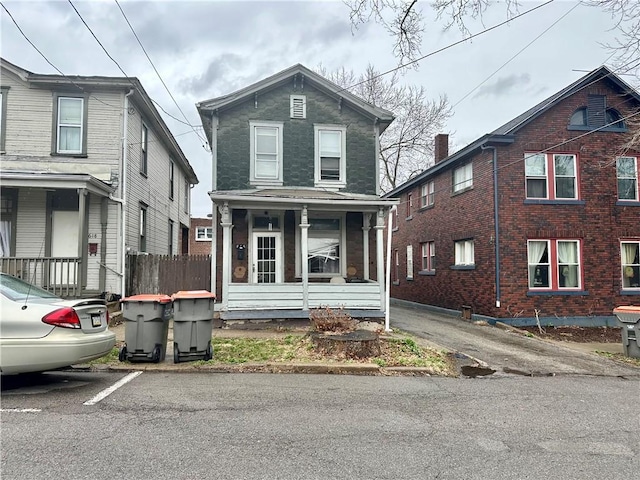 616 15th St, Beaver Falls, PA 15010 - view of front facade with a porch