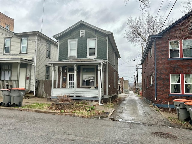 616 15th St, Beaver Falls, PA 15010 - view of front of house featuring covered porch and asphalt driveway