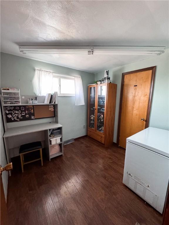 interior space featuring dark wood-type flooring