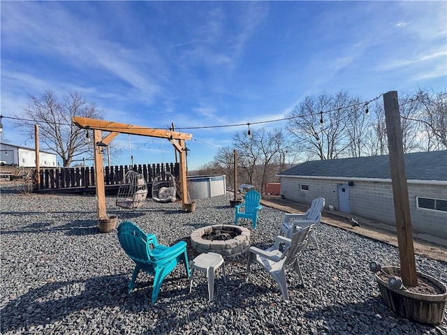 view of yard featuring a fire pit