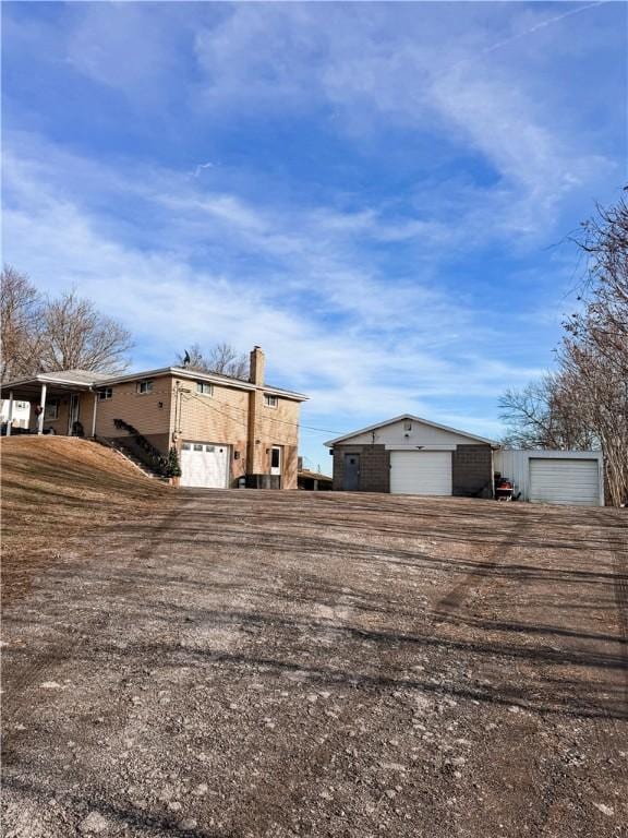 exterior space with a garage