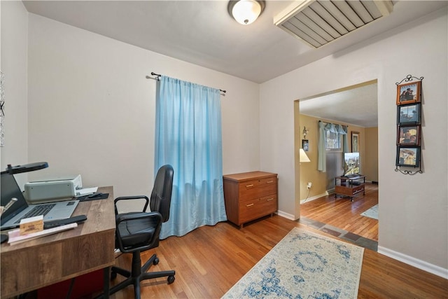 home office featuring light wood-type flooring