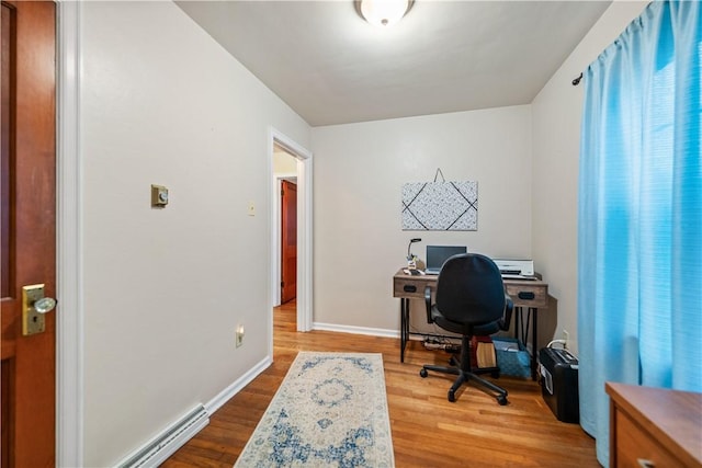 office area with hardwood / wood-style flooring