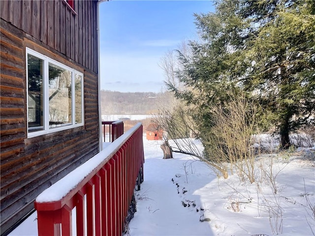 view of yard covered in snow