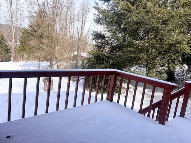 view of snow covered deck