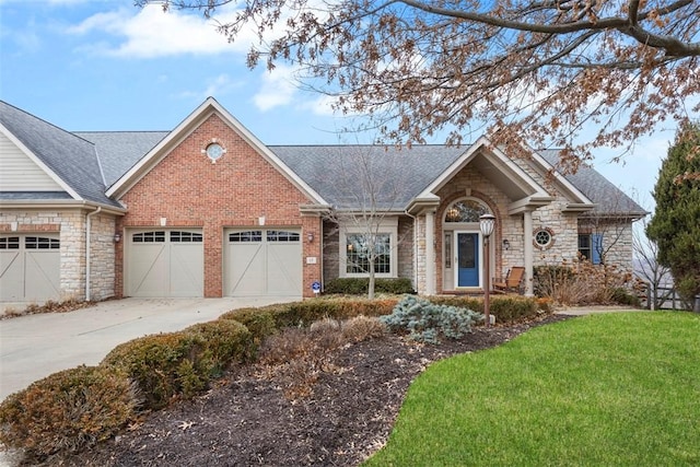 ranch-style home featuring a garage and a front lawn