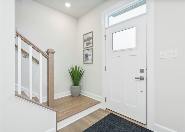 entrance foyer with light hardwood / wood-style floors