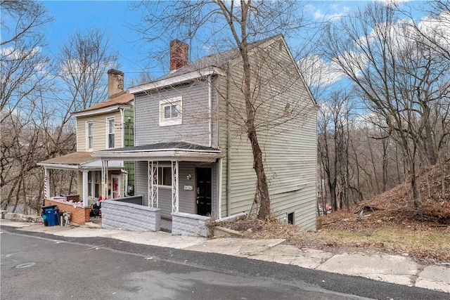 view of front of property featuring covered porch