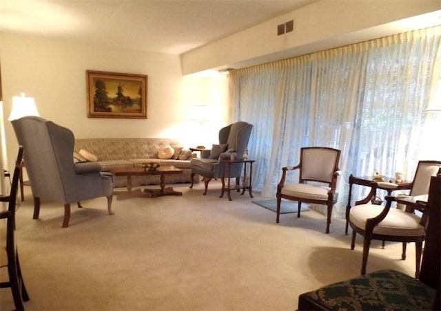 sitting room with light colored carpet