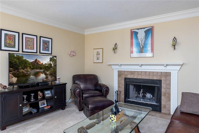 carpeted living room with a tile fireplace and ornamental molding