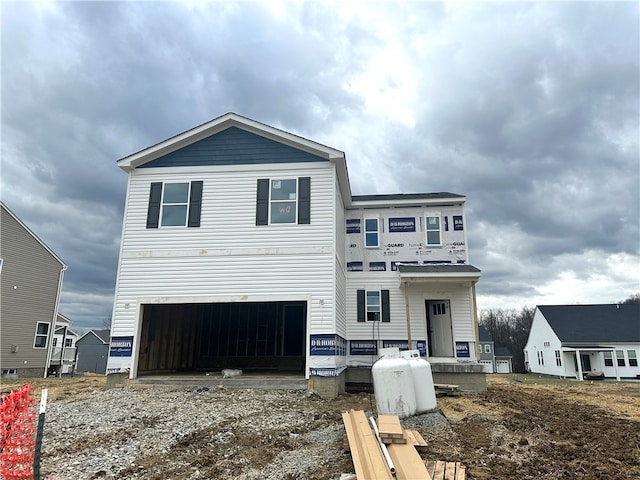 view of front of home with a garage