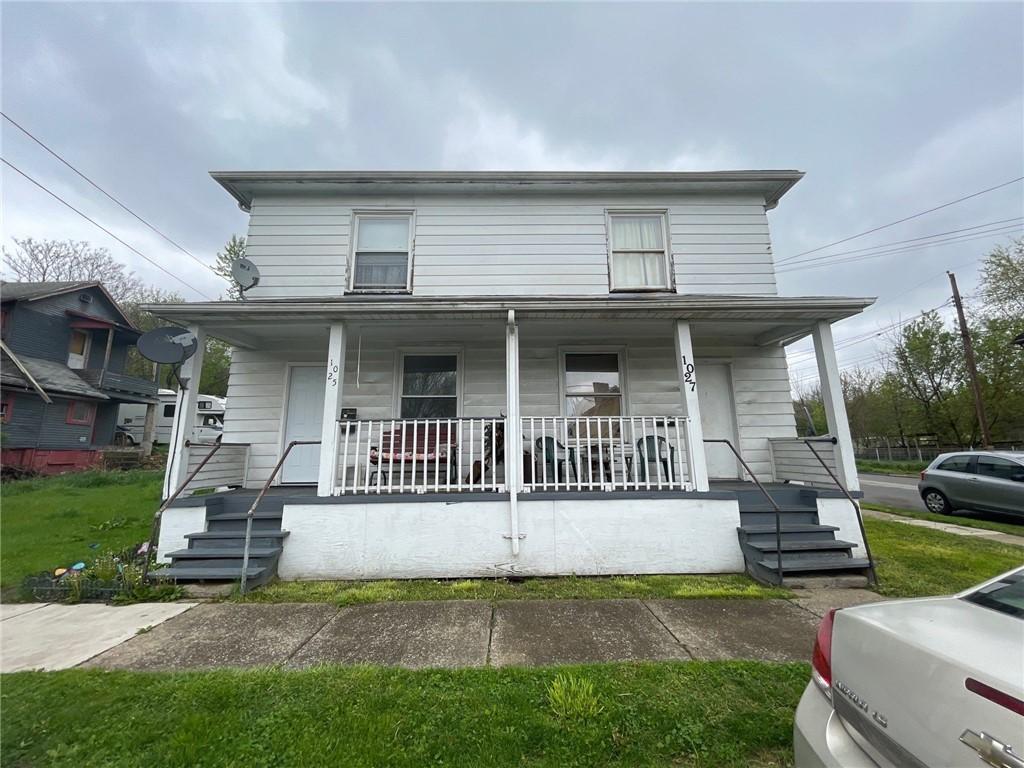 view of front of home featuring covered porch