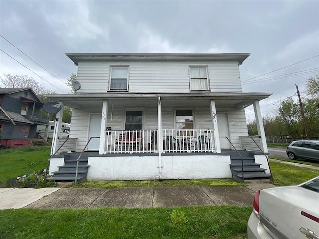 view of front of home featuring covered porch