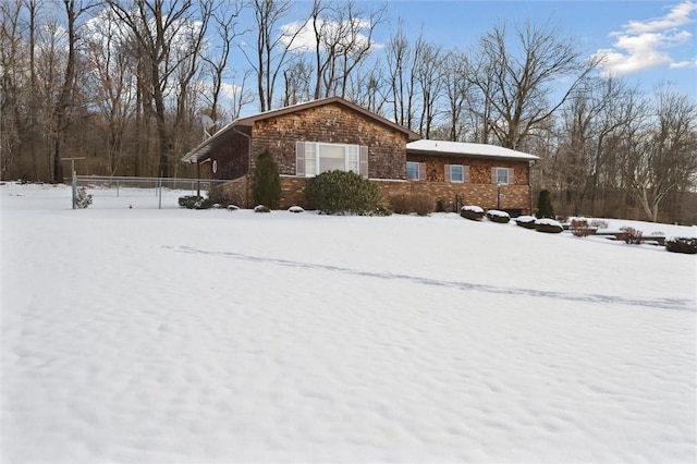 view of snow covered property