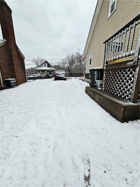 view of yard covered in snow