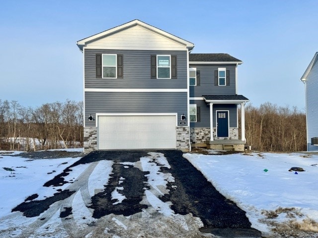 front facade with a garage