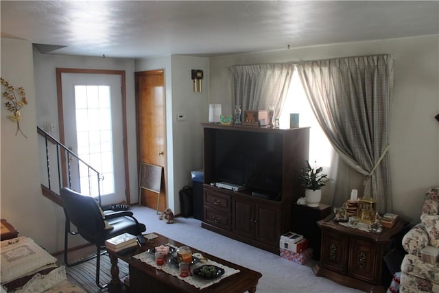 living room with light carpet