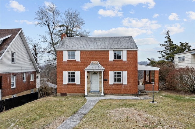 view of front facade with a front yard