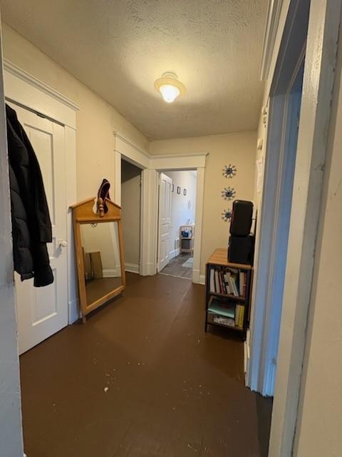 561/563 Sherman Ave, Sharon, PA 16146 - corridor with a textured ceiling and concrete flooring