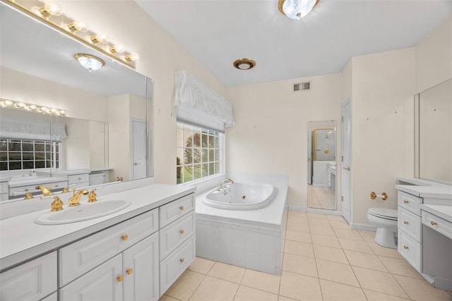 full bathroom featuring vanity, toilet, separate shower and tub, and tile patterned flooring