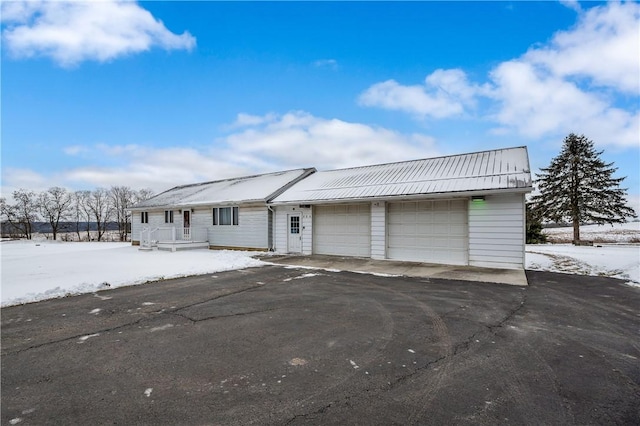 single story home with a garage